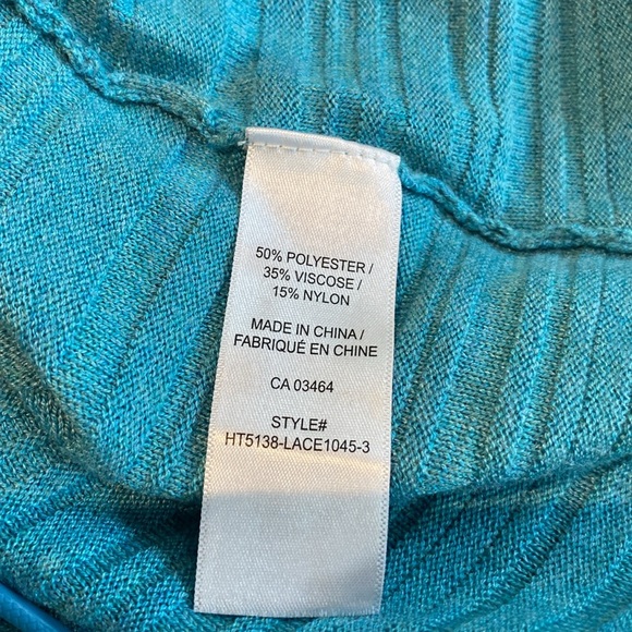 Ricki’s teal blue light sweater in size extra small. - Picture 8 of 9